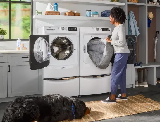 maytag-MED7020RW-washer-woman-dog
